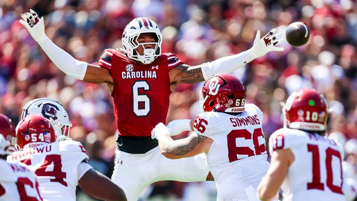 Dylan Stewart, defensive end, attempts to knock down a pass by John Mateer at Williams-Brice Stadium.