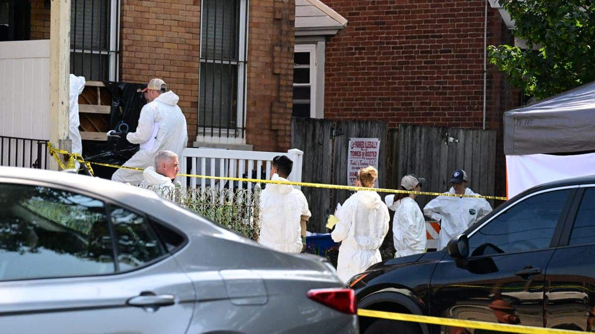 FBI agents execute a search warrant at Eugene Horsch's home in Philadelphia.