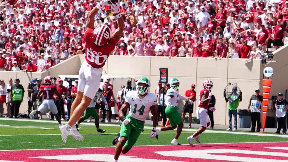 Charlie Becker catches a pass for a touchdown at Memorial Stadium.
