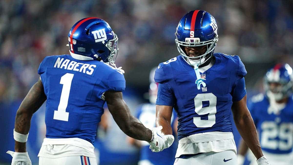 Isaiah Likely and Malik Nabers celebrate a touchdown during a New York Giants game at MetLife Stadium.