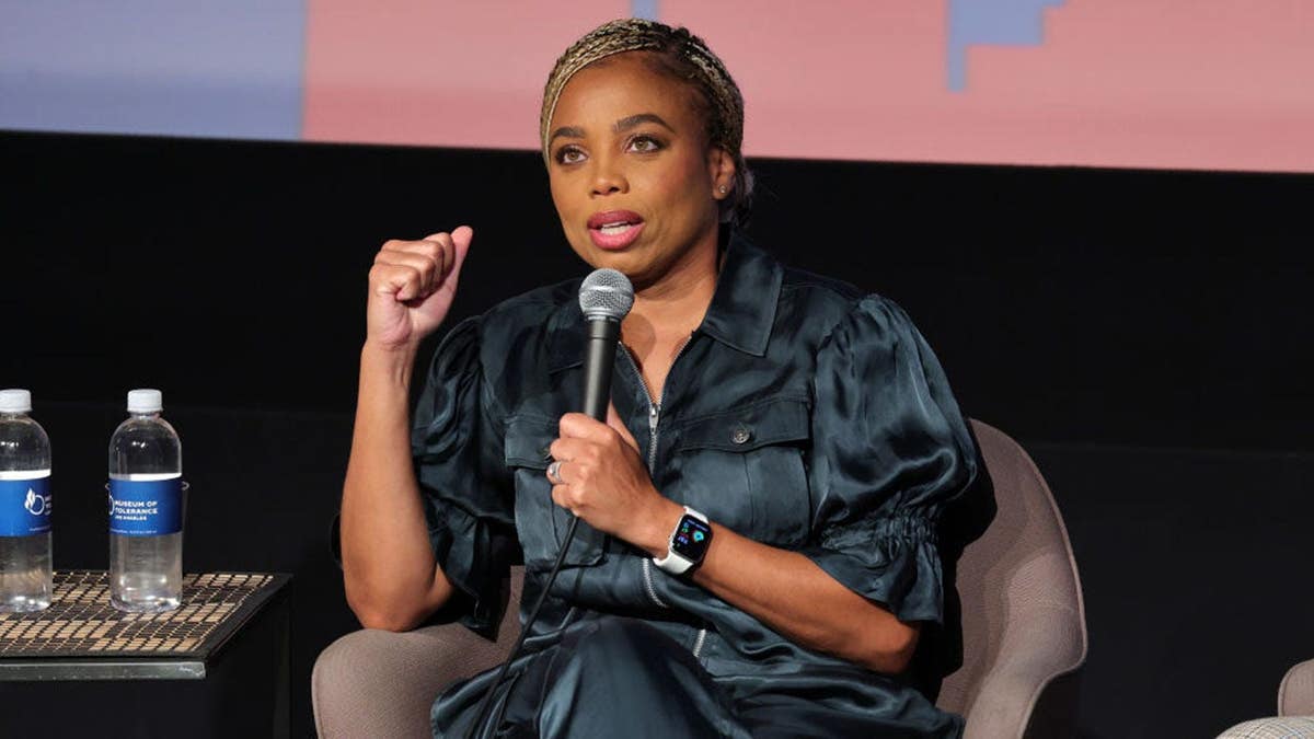 Jemele Hill speaking on stage at the NAACP Image Awards Hosts Hollywood House Symposium