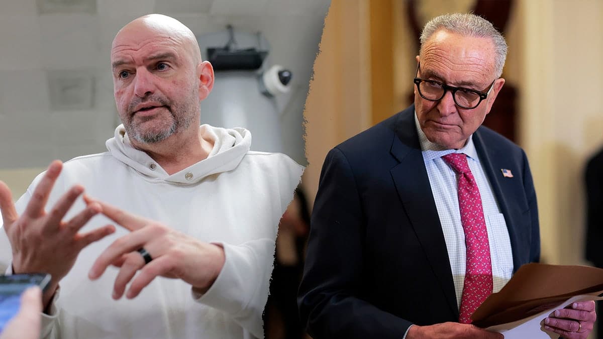 Senator John Fetterman, left, pictured alongside Senate Minority Leader Chuck Schumer, right