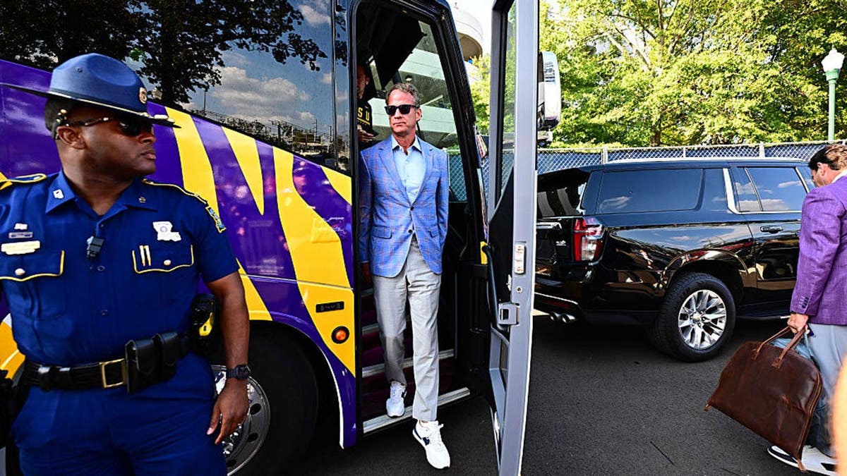 Lane Kiffin arrives at Vaught Hemingway Stadium in Oxford, Mississippi.