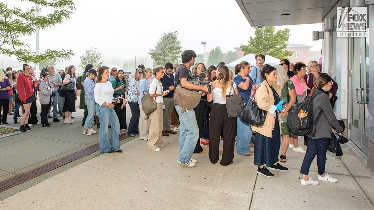 Supporters, spectators, and media are lined up outside Plymouth Superior Court, Plymouth, Massachusetts on Thursday.
