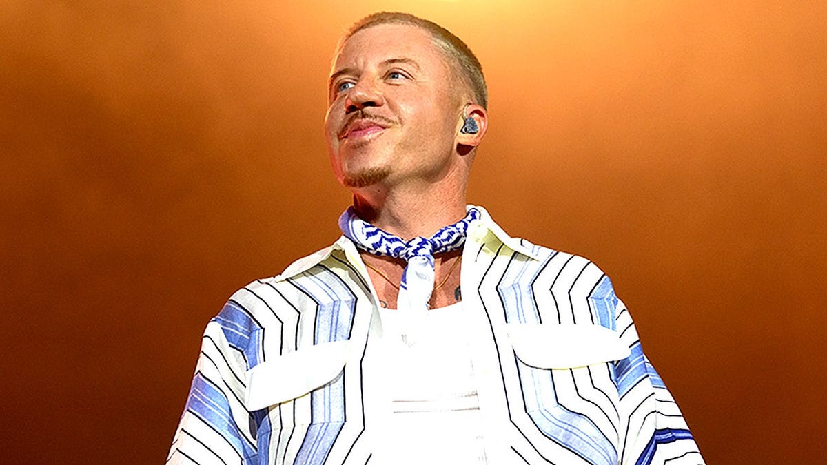 Macklemore performs live on stage at Lollapalooza Paris Festival.
