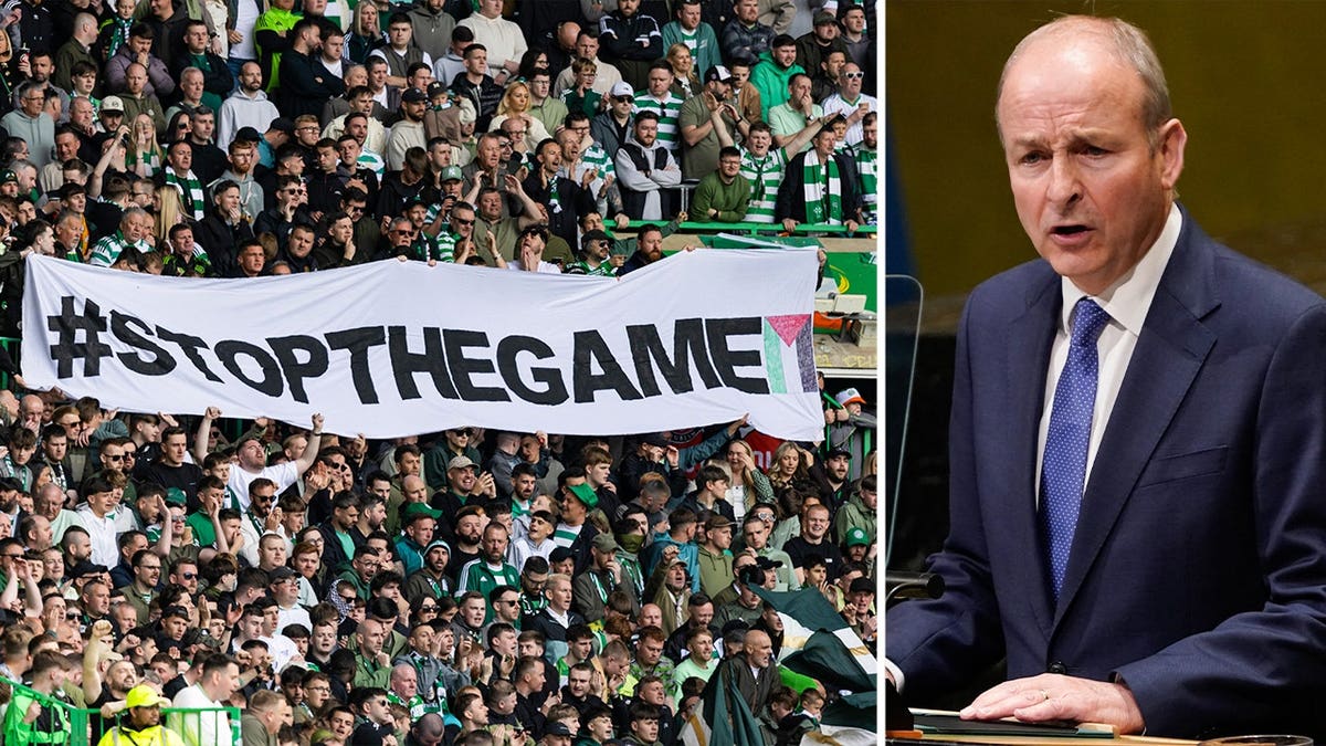 Irish Prime Minister Micheál Martin beside Celtic soccer fans holding a