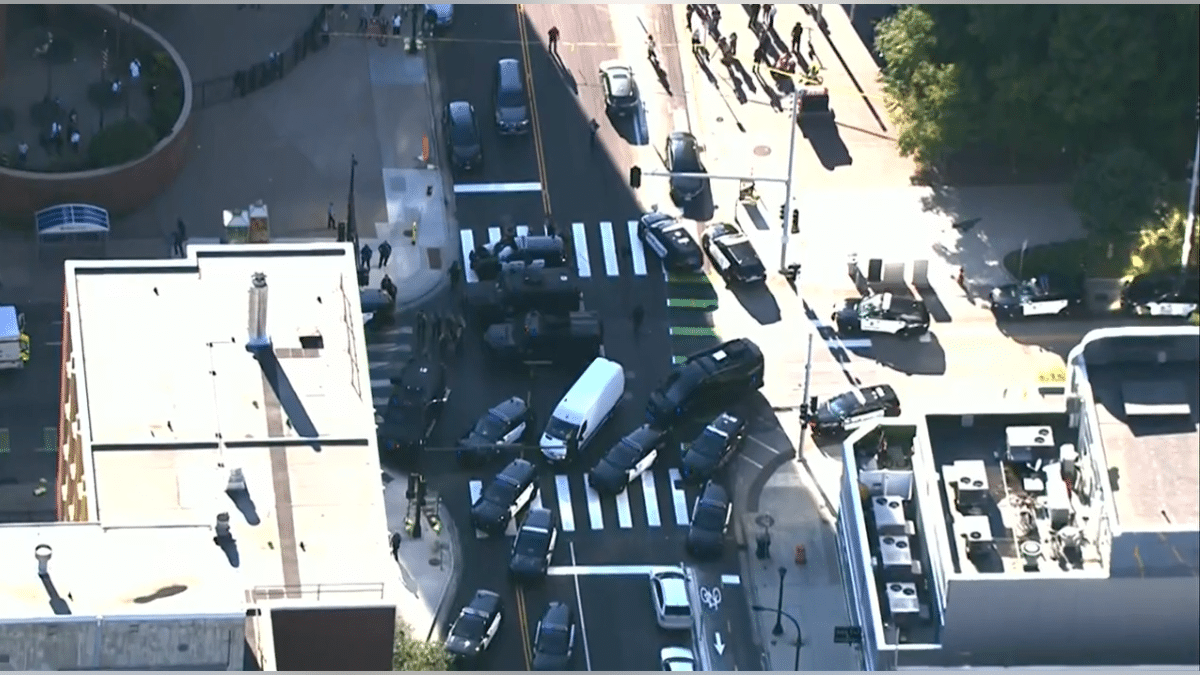 Law enforcement react to the scene of shooting in Minneapolis, Wednesday, Sept. 2, 2036.