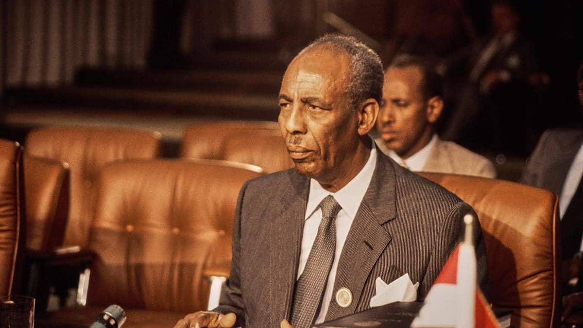Mohammed Siad Barre stands for a portrait photograph.