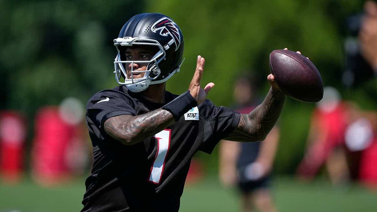 Tua Tagovailoa runs drills during Atlanta Falcons training camp practice.