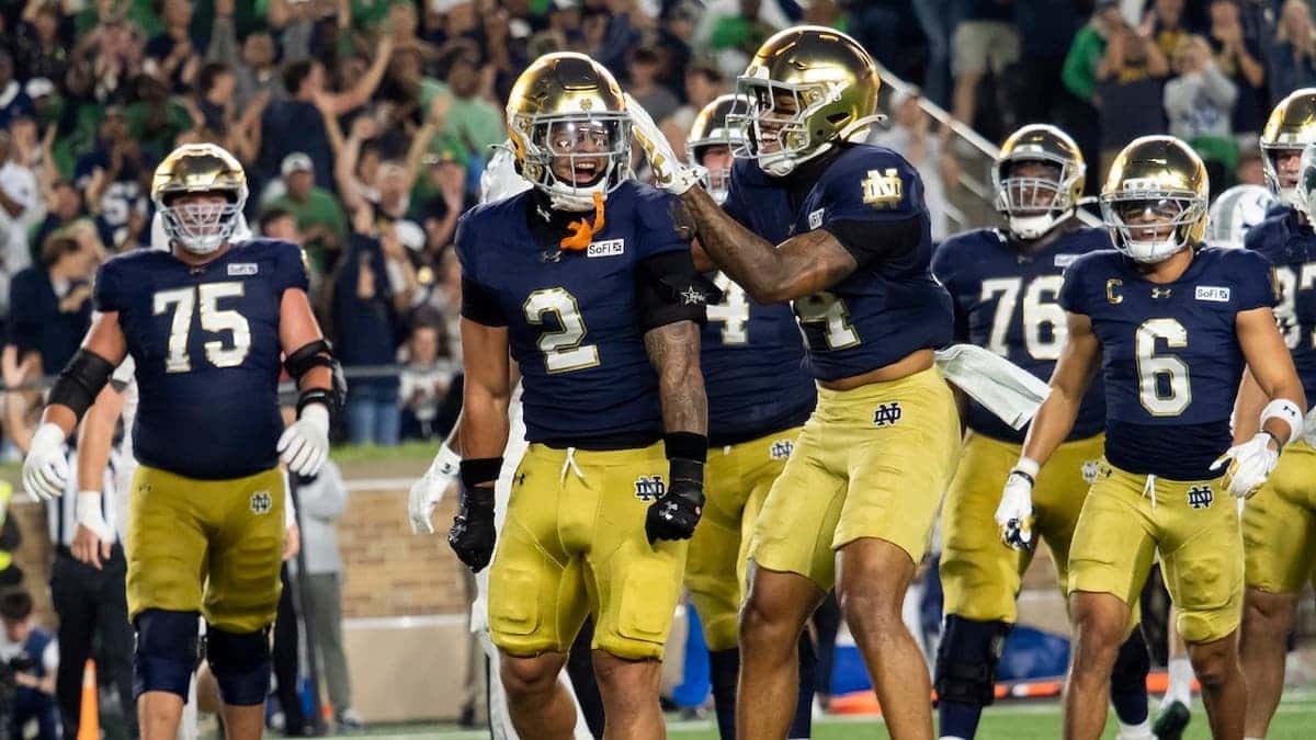 Nolan James Jr. celebrates after scoring a touchdown at Notre Dame Stadium.
