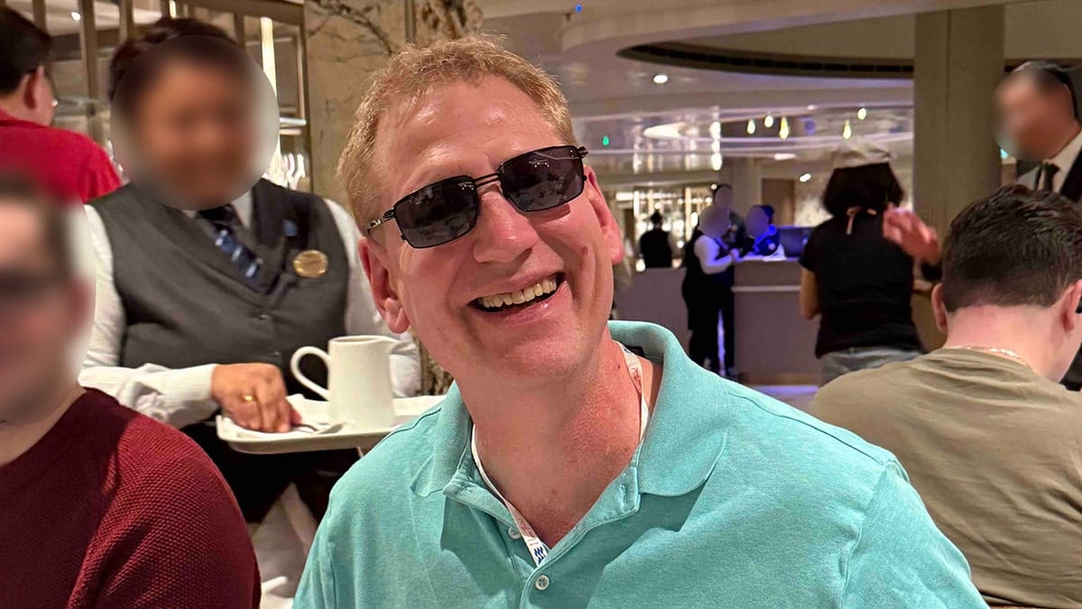 Steve Junker wearing sunglasses and smiling.