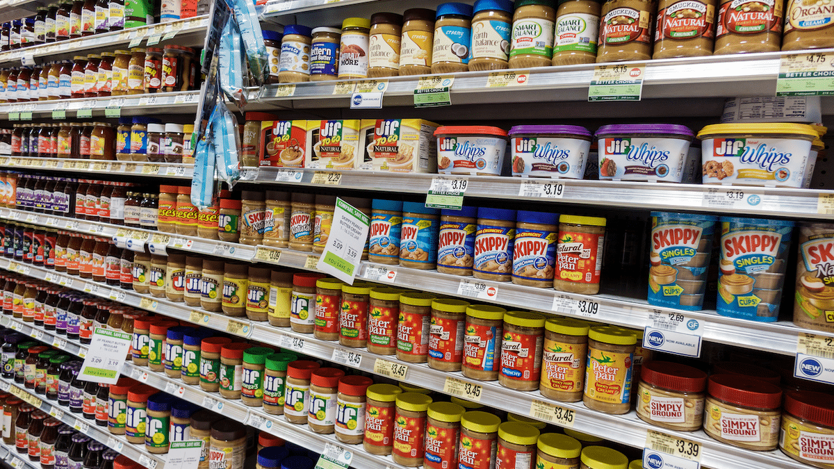 Peanut butter jars on shelves inside a Publix supermarket in Fort Lauderdale, Fla.