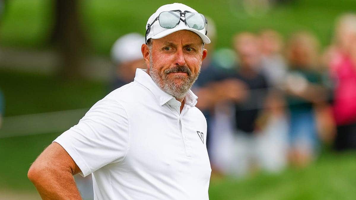 Phil Mickelson reacts after a missed putt on the 16th green.