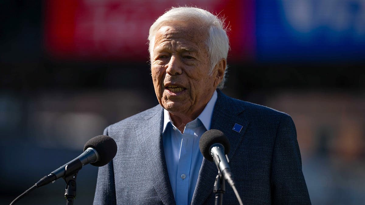 Robert Kraft speaks at a press conference on the field at Gillette Stadium.