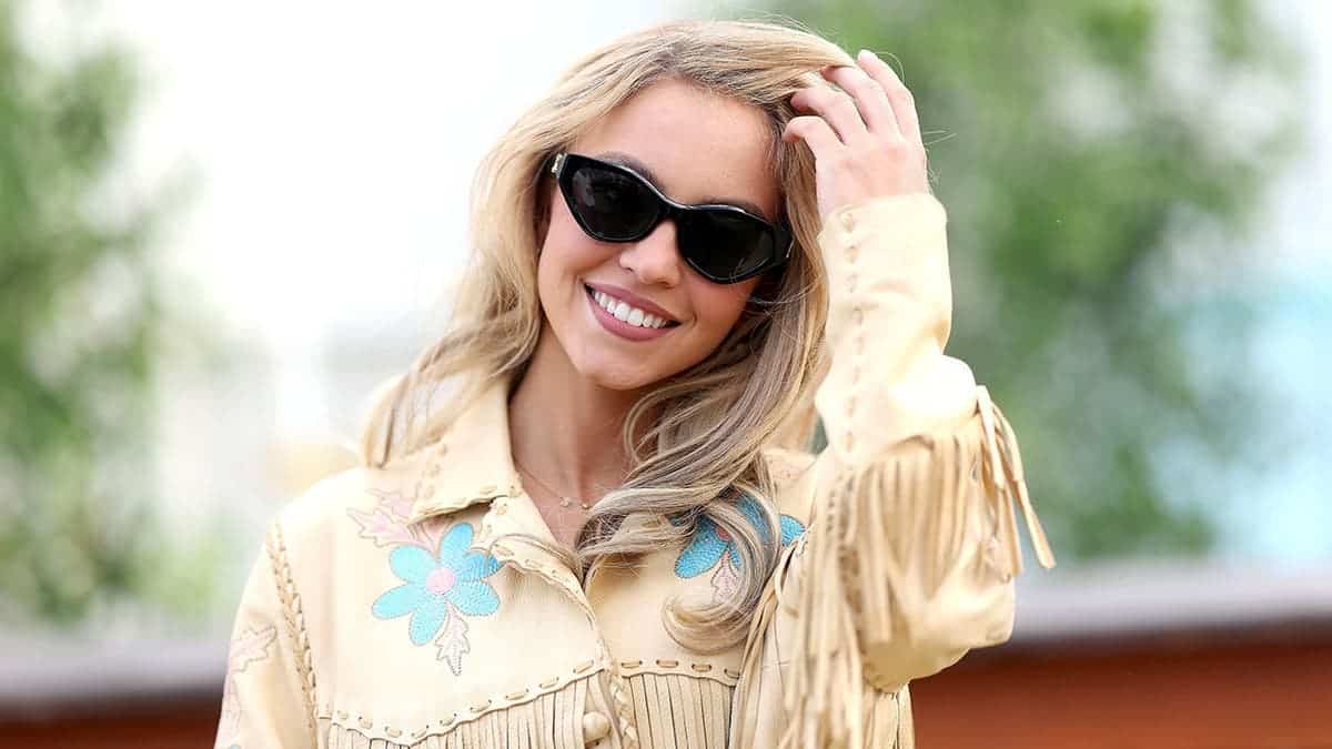 Sydney Sweeney poses for a portrait backstage at Stagecoach Festival.