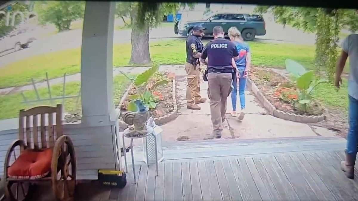 A woman being arrested
