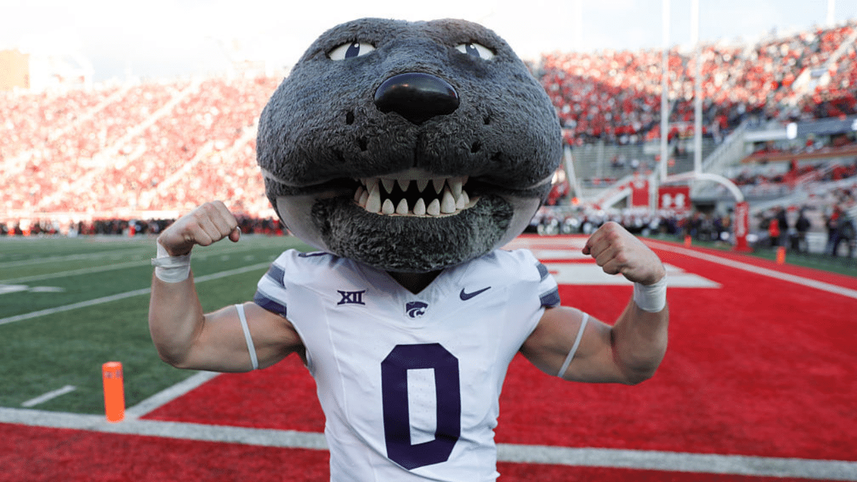 Willie the Wildcat mascot cheers during a football game at Rice-Eccles Stadium.