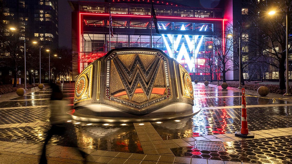 WWE logo illuminated on the WWE headquarters building in Stamford, Connecticut.