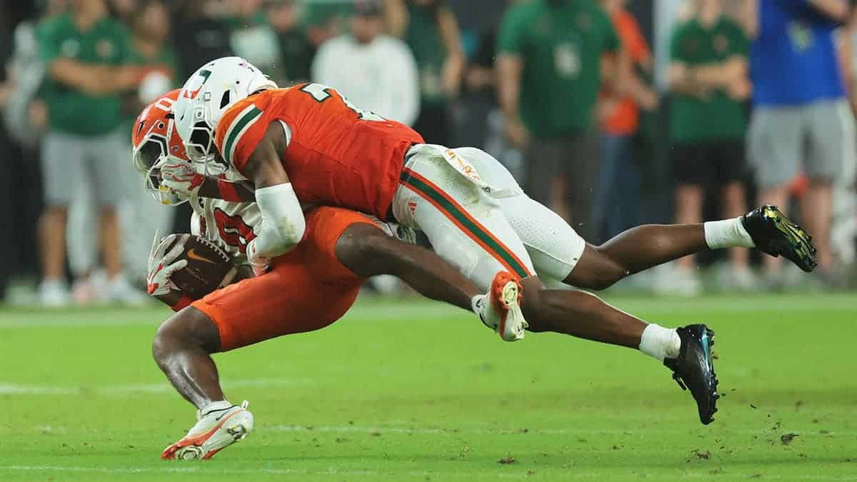 Zechariah Poyser tackles Corey Petty during a game at Hard Rock Stadium.