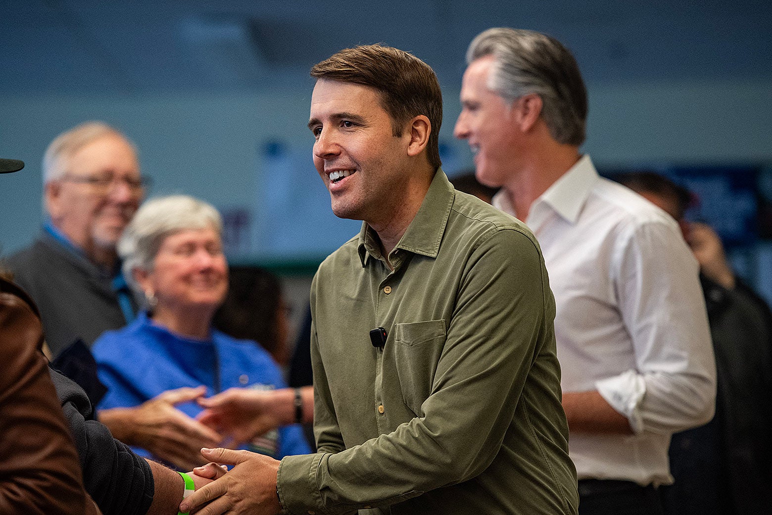 Chris Pappas is shaking hands at an event.