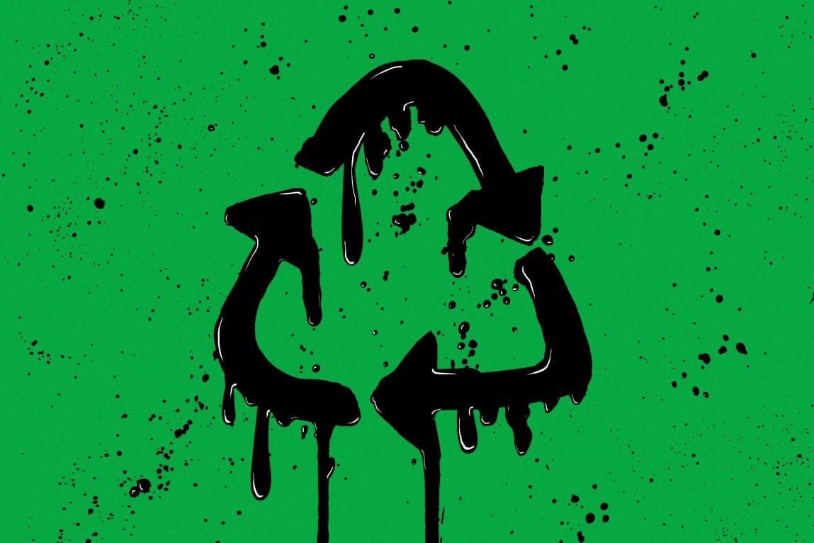 A chasing arrows recycling symbol made of dripping crude oil.