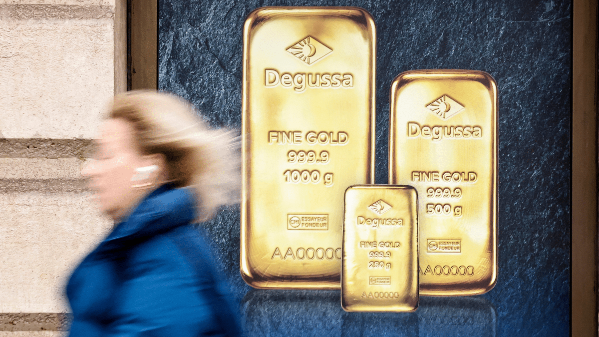 A poster depicting investment gold bars is seen on a gold dealer's window in Madrid, on January 30, 2026.