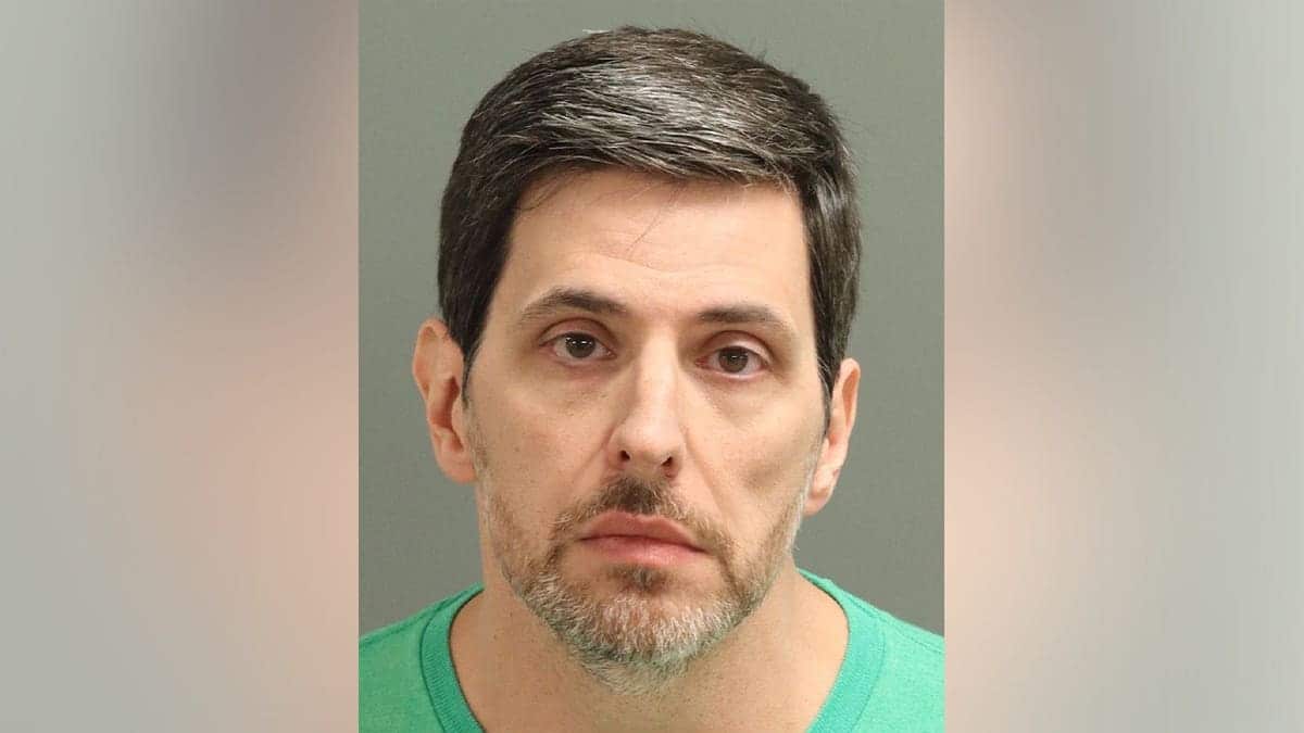 Close-up mugshot of former