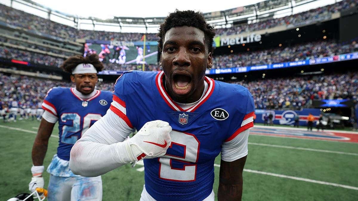Deonte Banks #2 celebrates after the Giants game at MetLife Stadium.