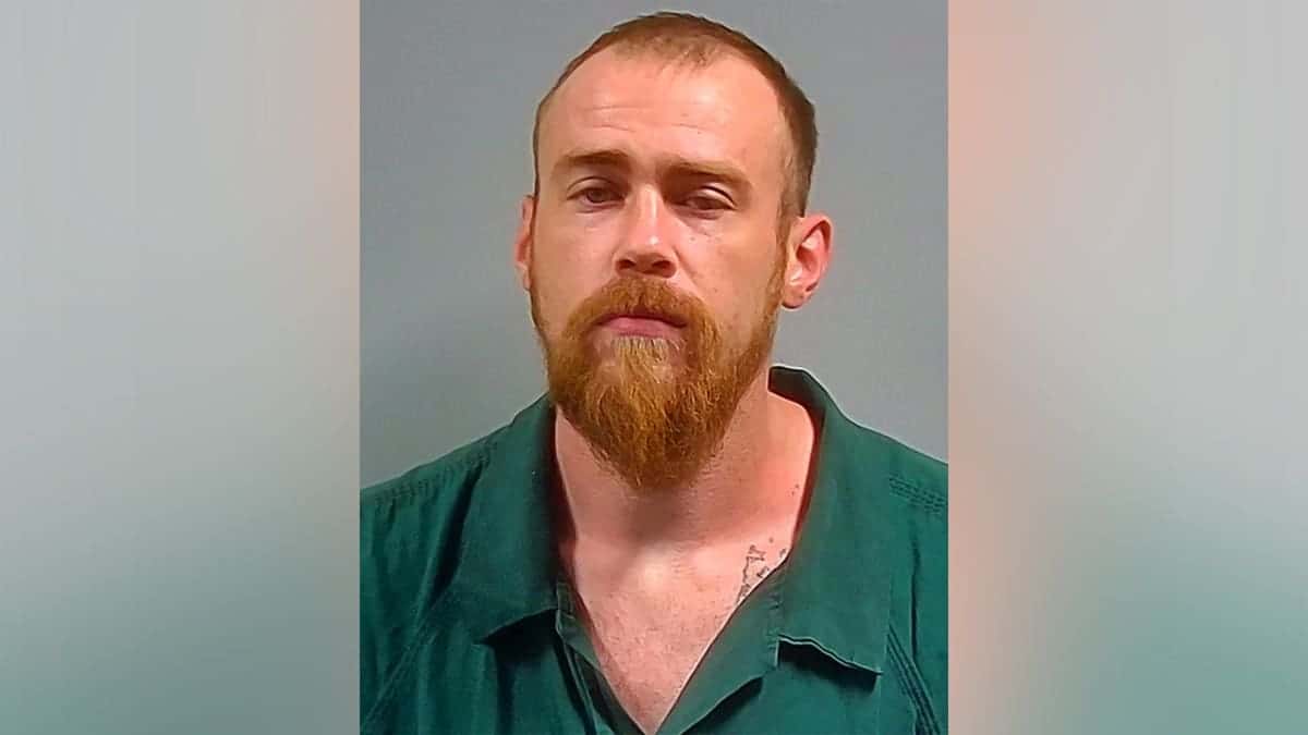 Dustin Kelley is pictured following his arrest in Escambia County, Florida.