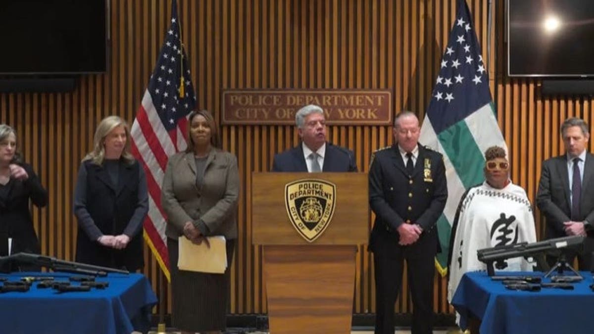 New York City district attorneys at a news conference.