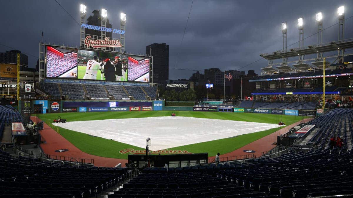 Tarp covers the field at Progressive Field in Cleveland, Ohio