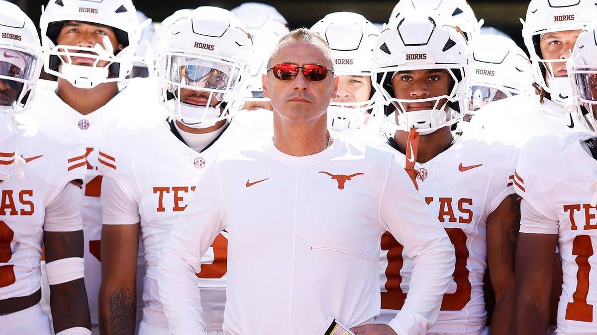Steve Sarkisian looks on before a game at Neyland Stadium