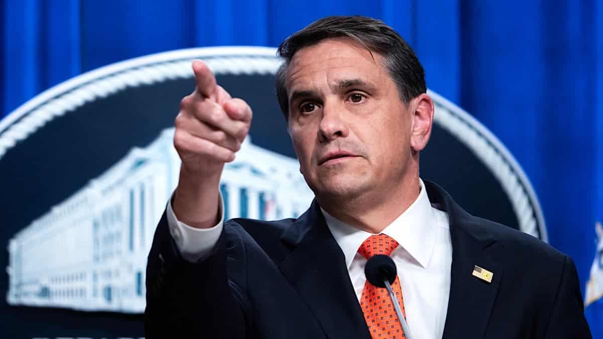 Acting Attorney General Todd Blanche speaking at a news conference at the Department of Justice