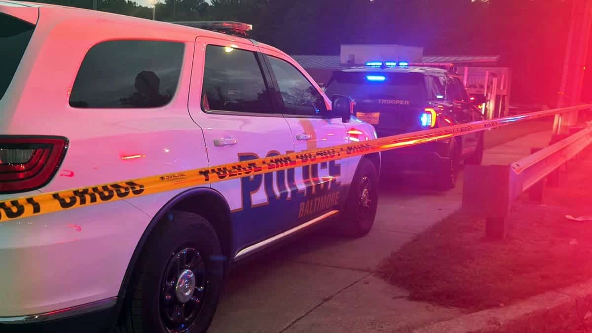 Police respond after a 12-year-old girl was killed and three adults were wounded after gunfire erupted near a youth football game at Leon Day Park in Baltimore