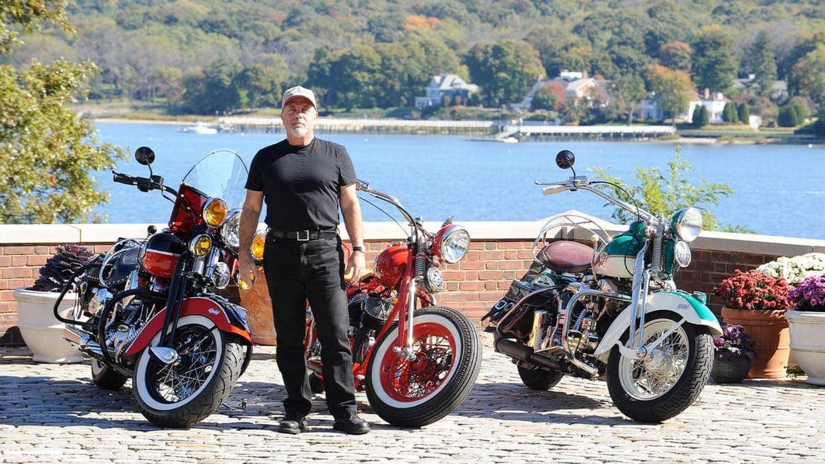 Billy Joel next to motorcycles