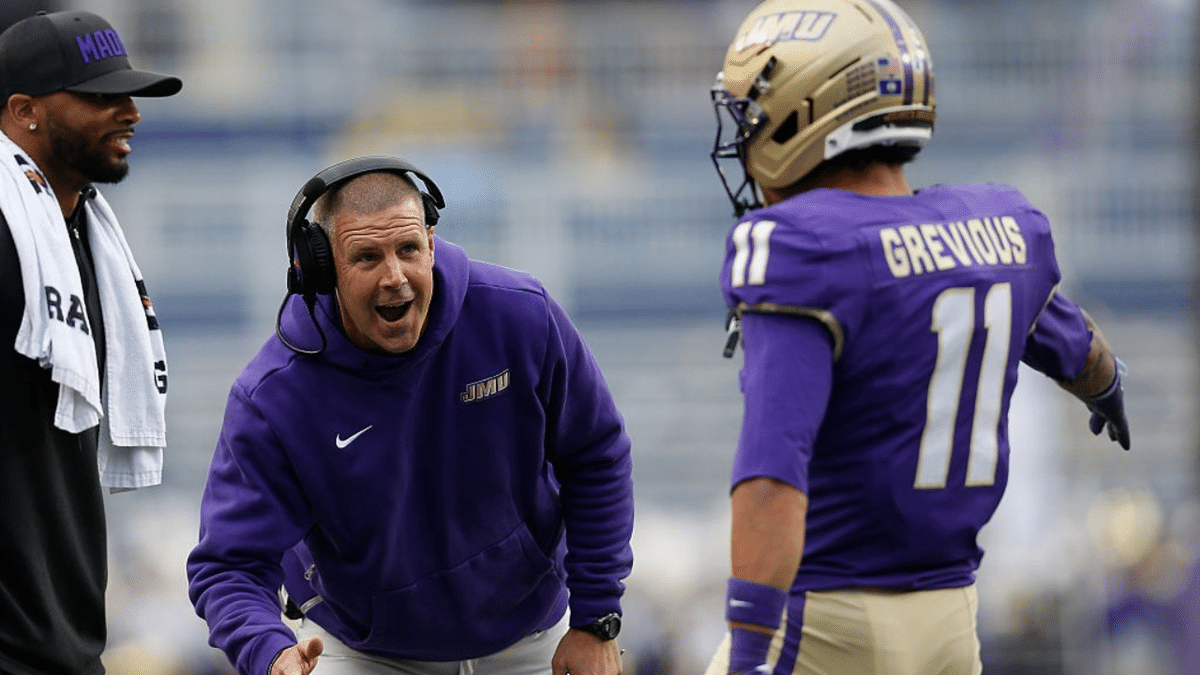 Billy Napier congratulates Noah Grevious after scoring a touchdown.