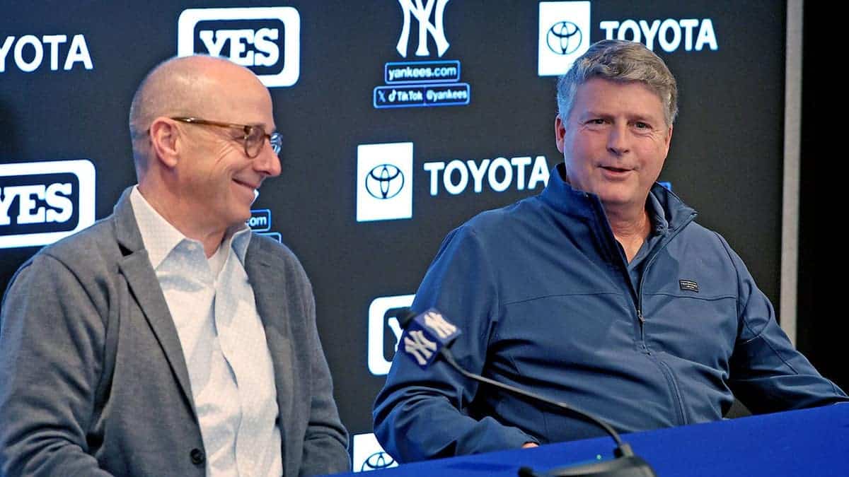Brian Cashman and Hal Steinbrenner speak at a press conference regarding Yankees facial hair policy.