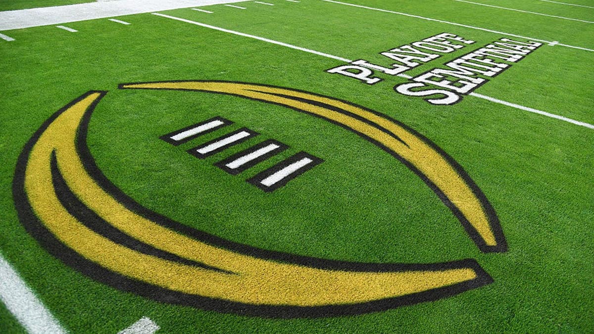 CFP logo on the field at State Farm Stadium before the Fiesta Bowl