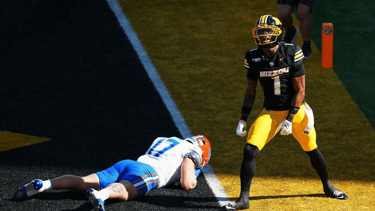 Chris Graves Jr. celebrates after breaking up a pass at Faurot Field.