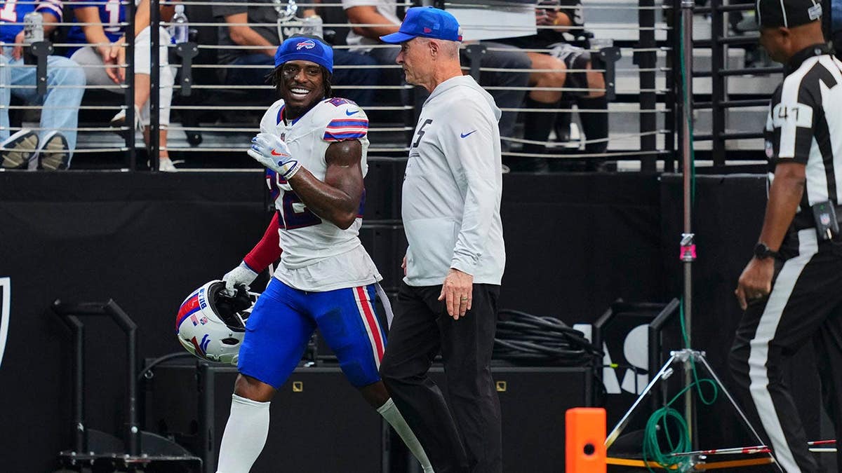 C.J. Gardner-Johnson, Buffalo Bills player number 22, walks off the field after being ejected.
