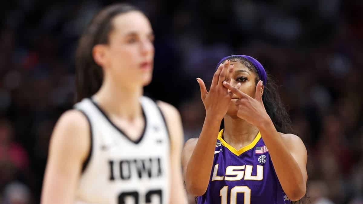 Angel Reese reacts toward Caitlin Clark during NCAA Women's Basketball Tournament championship game.