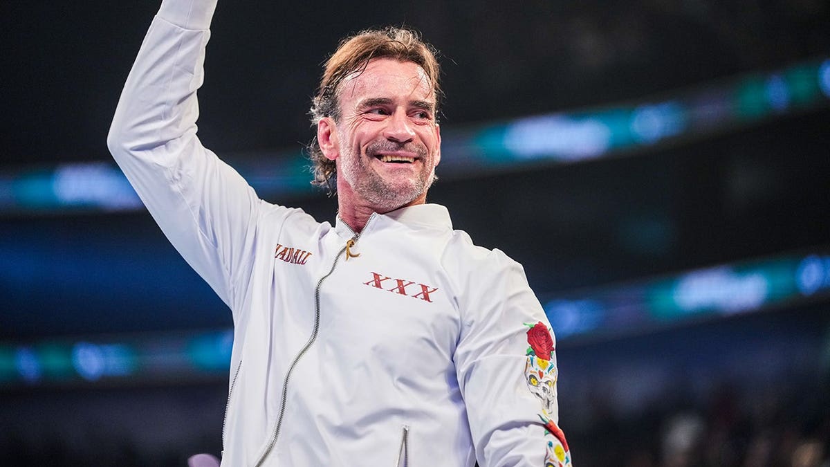 CM Punk enters the ring during Money in the Bank wrestling event in New Orleans.