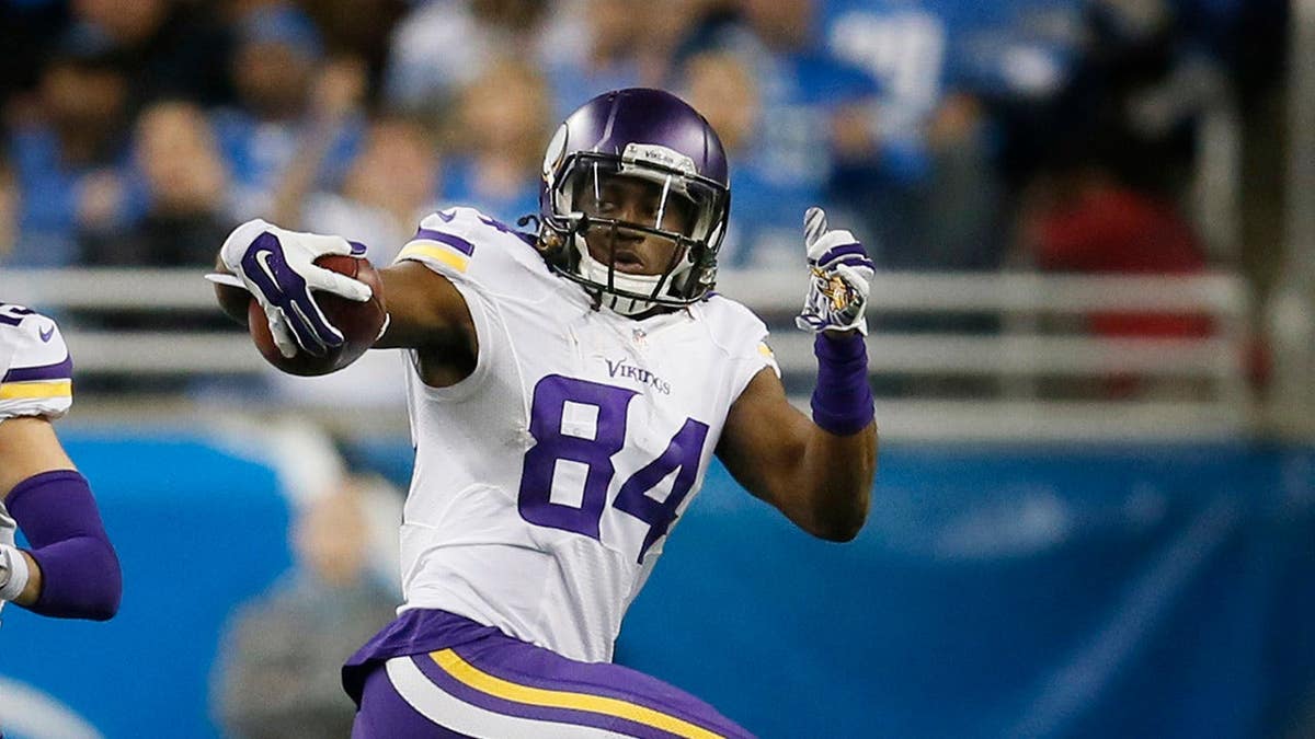 Cordarrelle Patterson returns a kickoff during a game at Ford Field.