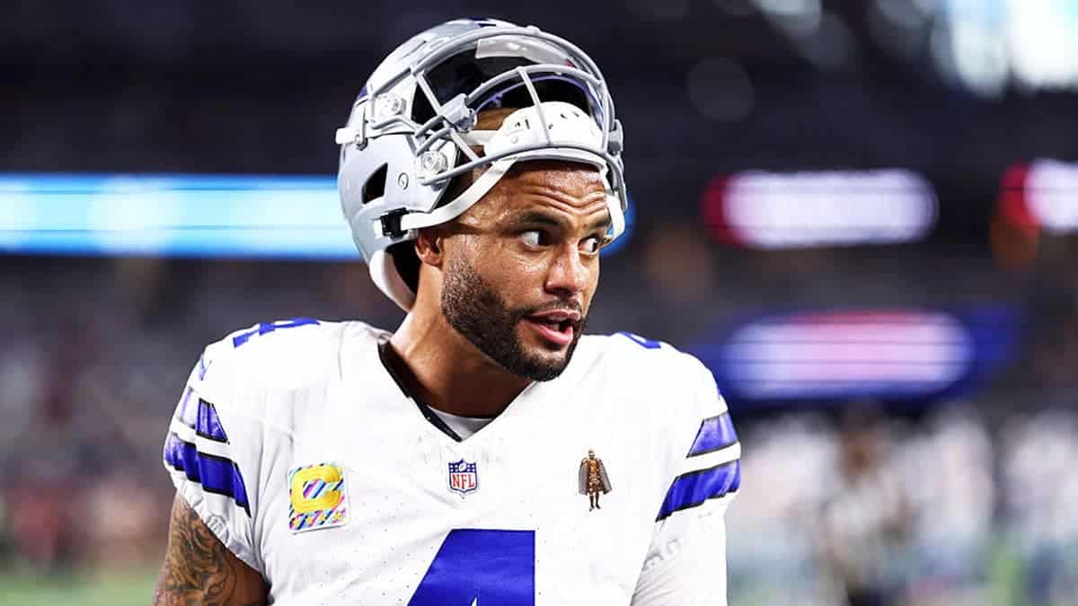Dak Prescott warms up before an NFL game at AT&T Stadium in Arlington, Texas.