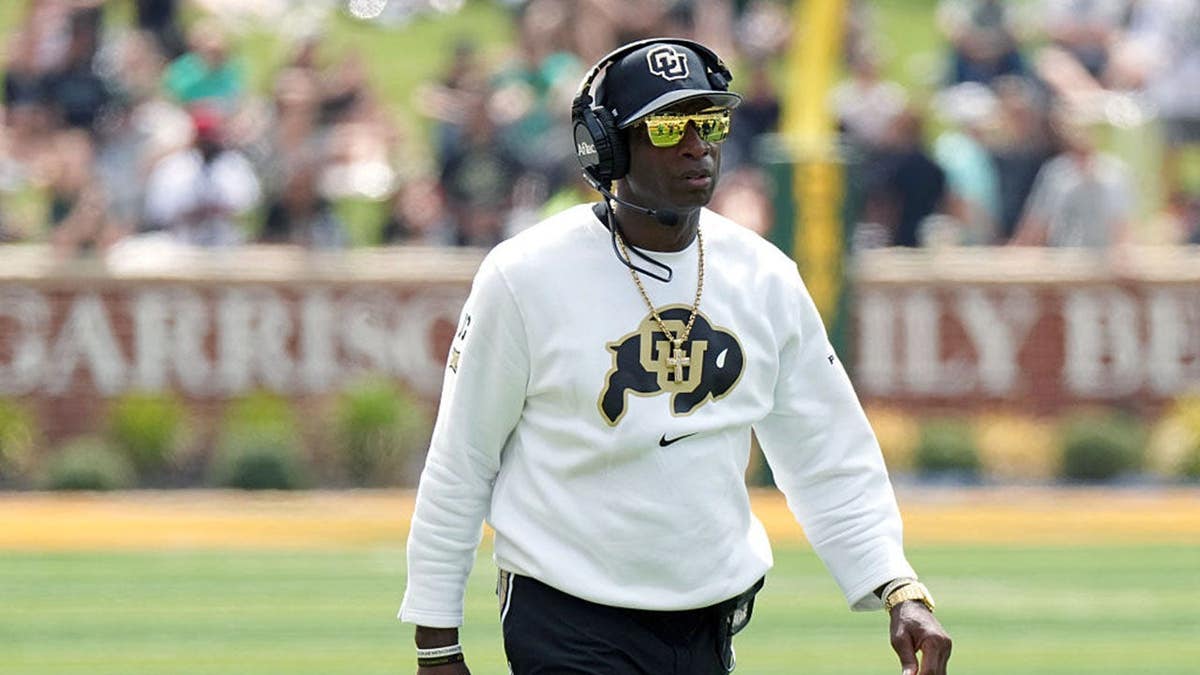Deion Sanders observes the game at McLane Stadium in Waco, Texas.