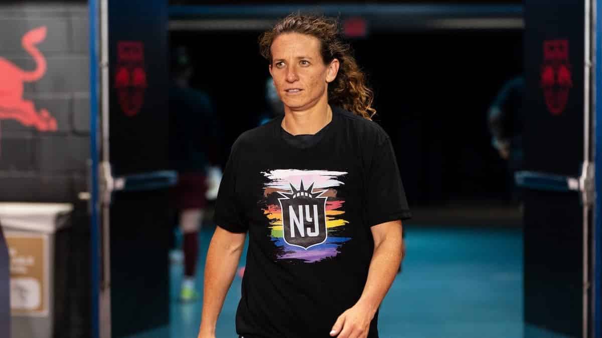 Elizabeth Eddy stands before a game at Red Bull Arena.