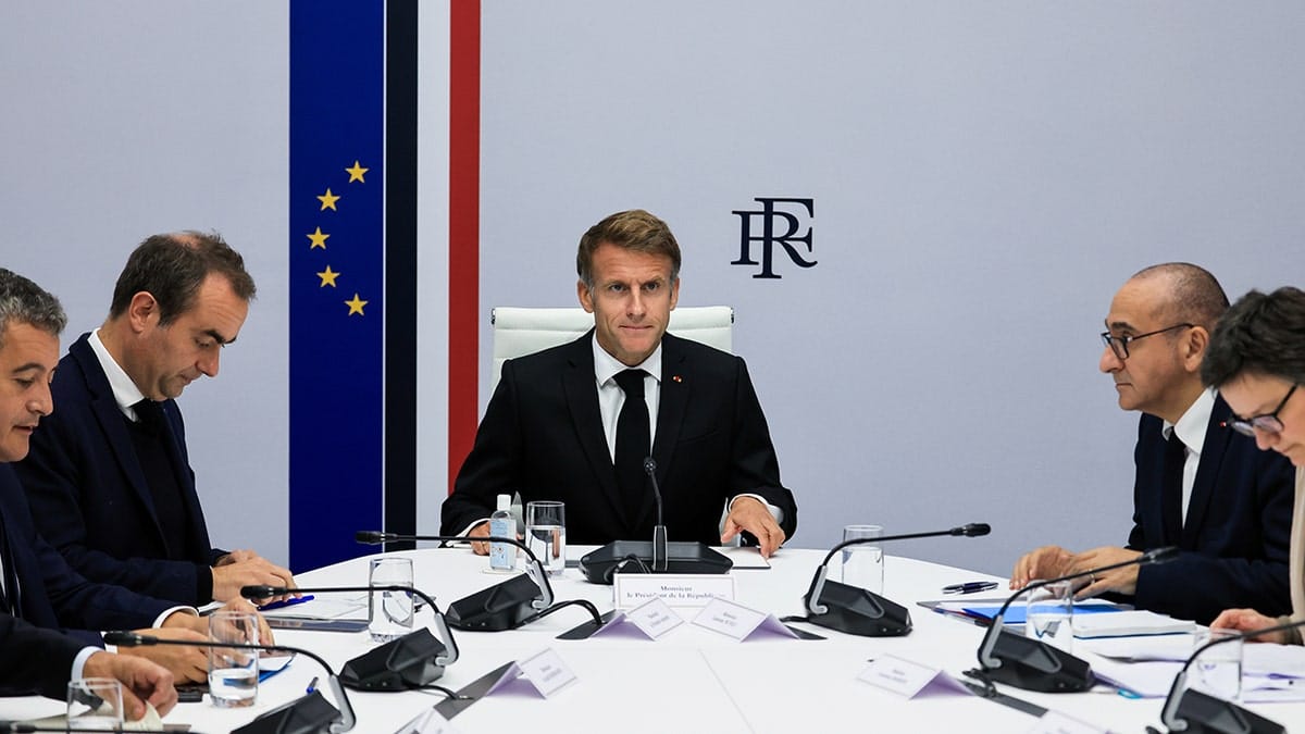 France's President Emmanuel Macron protests