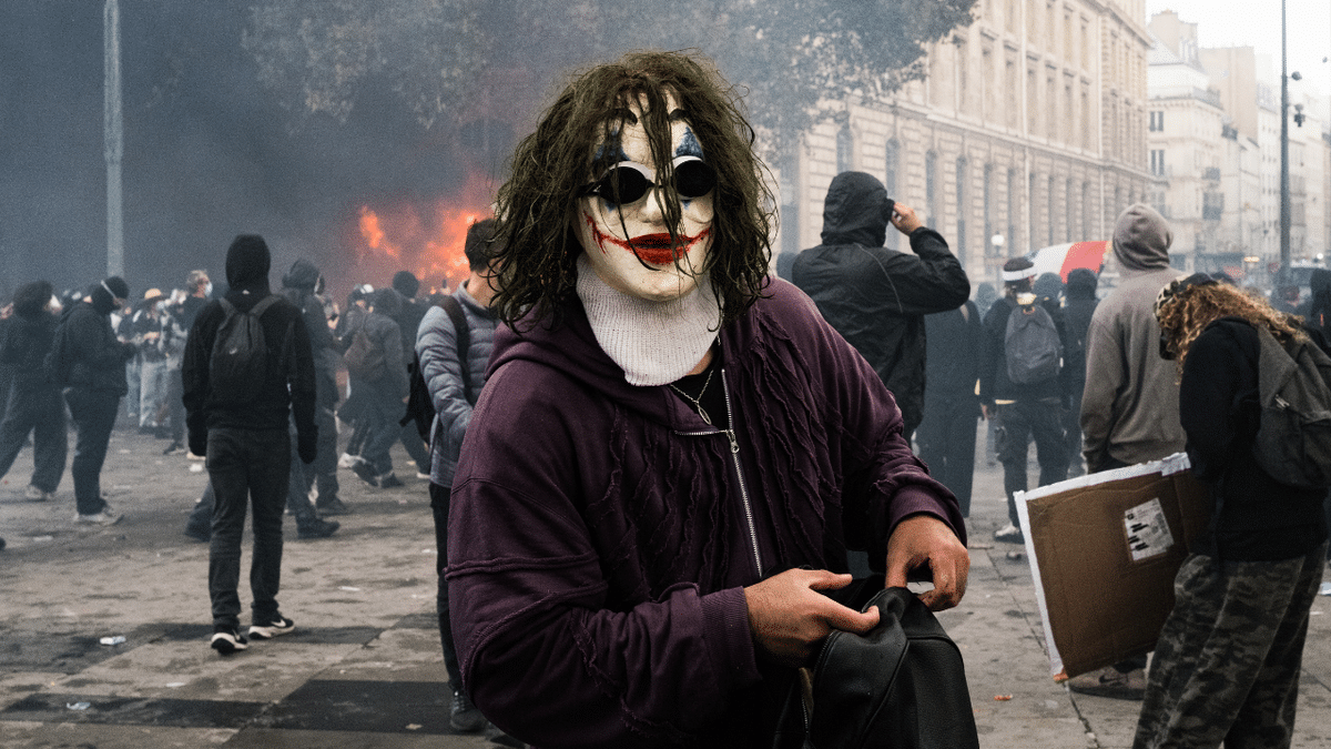 Clashes occur between protesters throwing projectiles and police responding with tear gas during a demonstration against the high cost of living in Paris, France, on October 17, 2026.