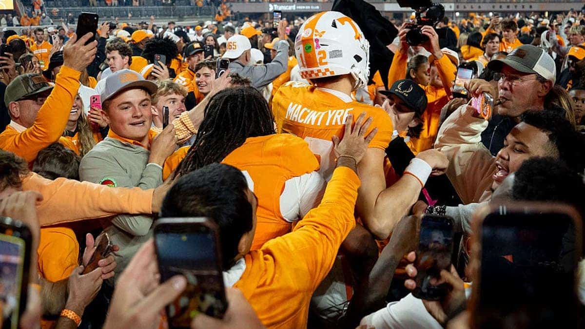 George MacIntyre celebrates with fans after Tennessee defeats Alabama at Neyland Stadium.