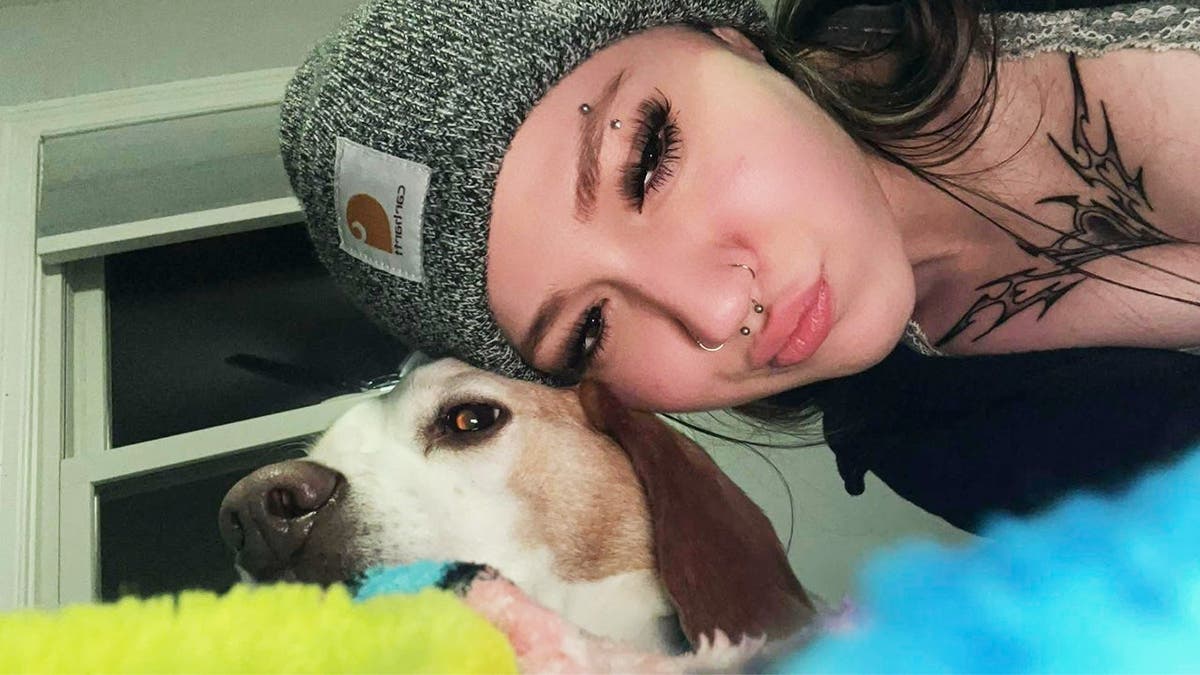 image shows Smith with her dog.